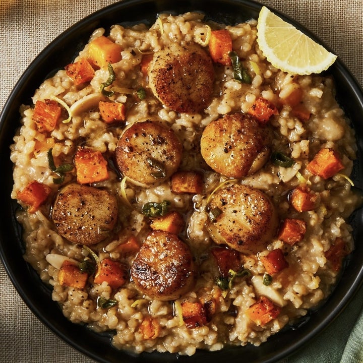 A rice risotto with scallops